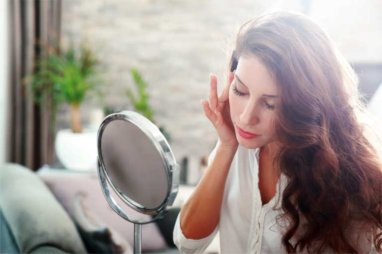 woman with mirror