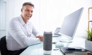 man using voice assistant