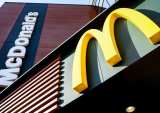 McDonald's Sales Drop; CEO Takes 50 Pct. Pay Cut