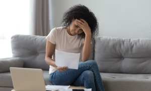 millennial woman financial stress