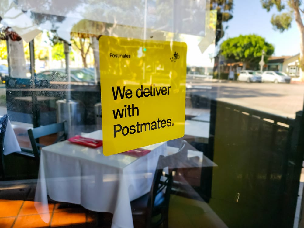 Uber Closes On 2.6B Deal To Buy Postmates