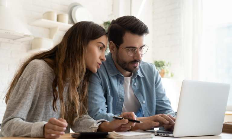 couple viewing online finance