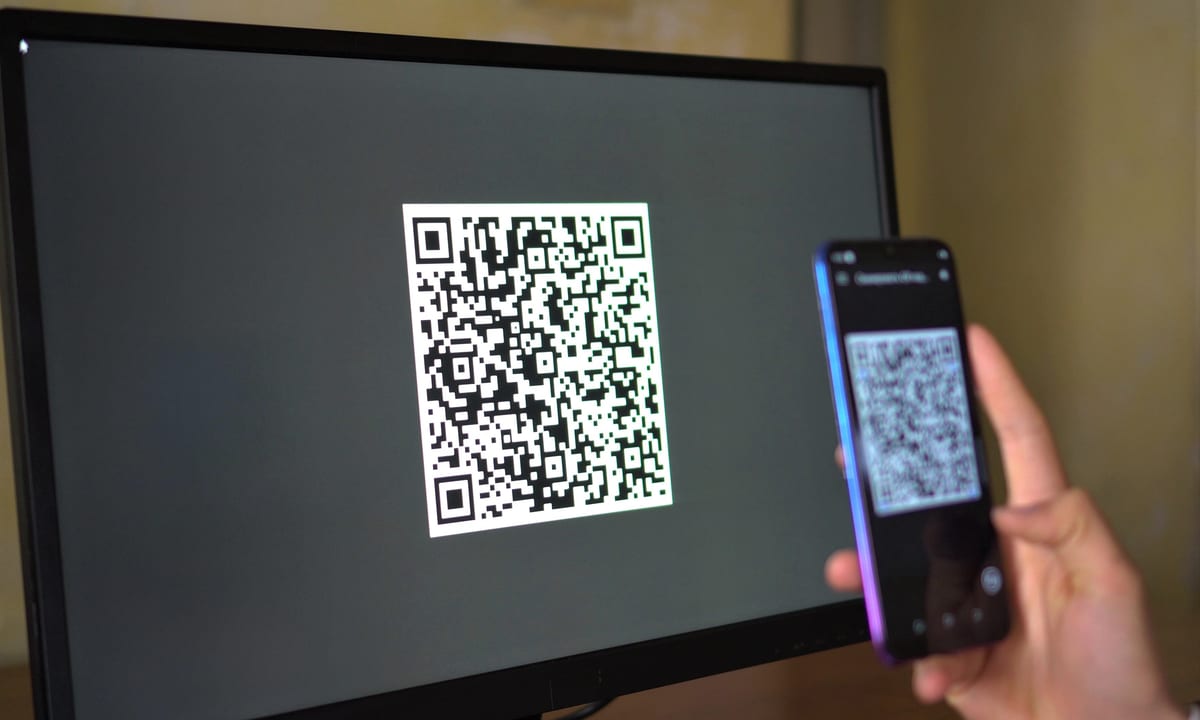 QR code scanning on mobile phone correct mark finish with coins
