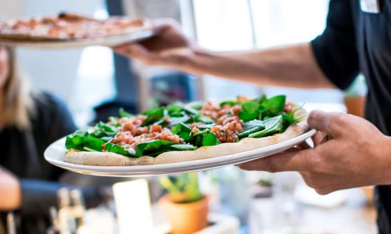 restaurant serving pizza