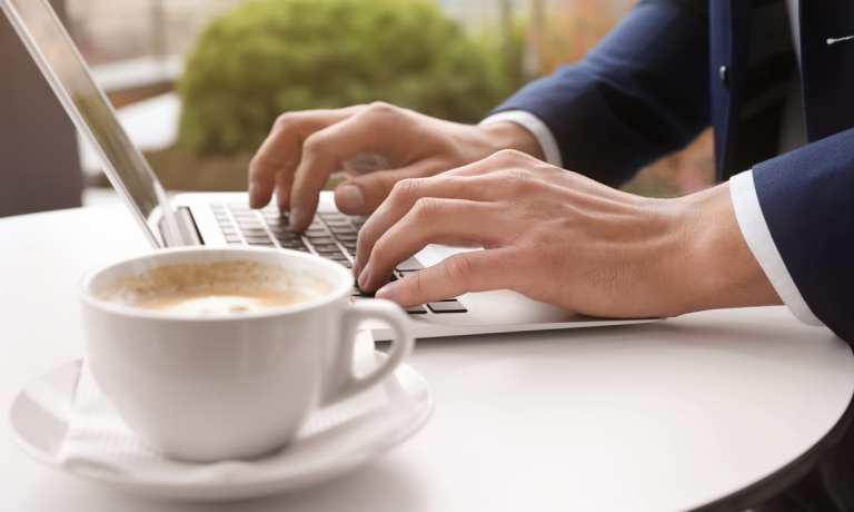 remote worker in restaurant