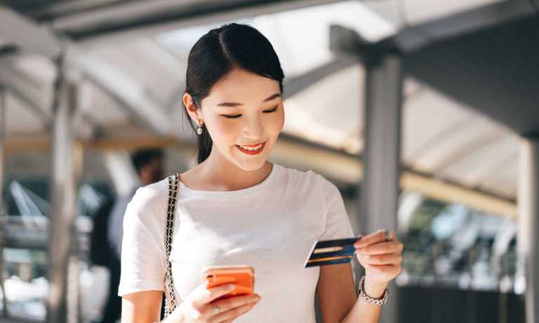 woman shopping on smartphone