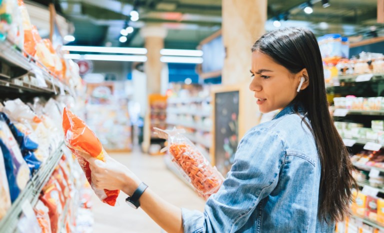 grocery shopper checking product