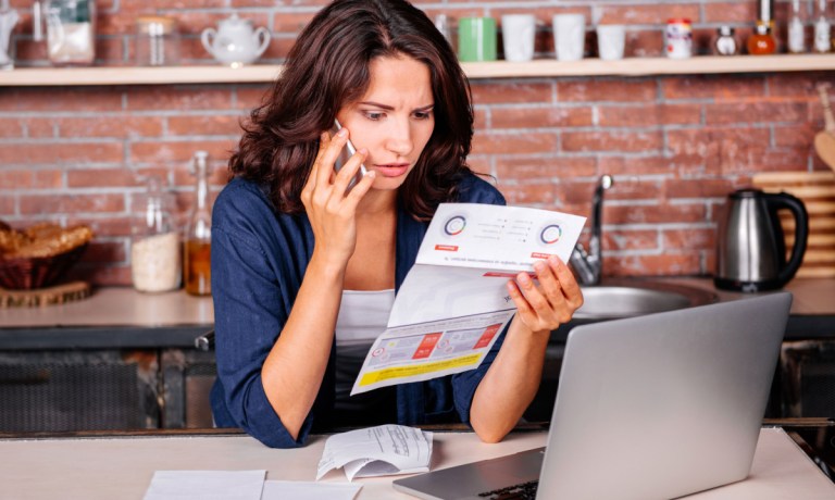 woman with utility bill