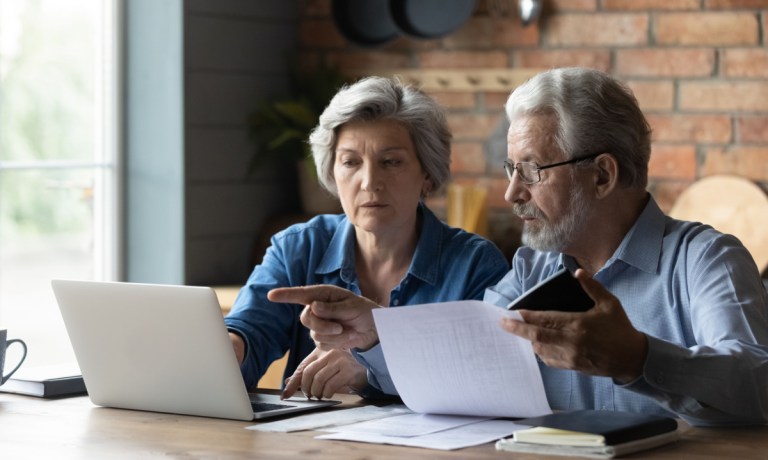 couple looking at healthcare bills