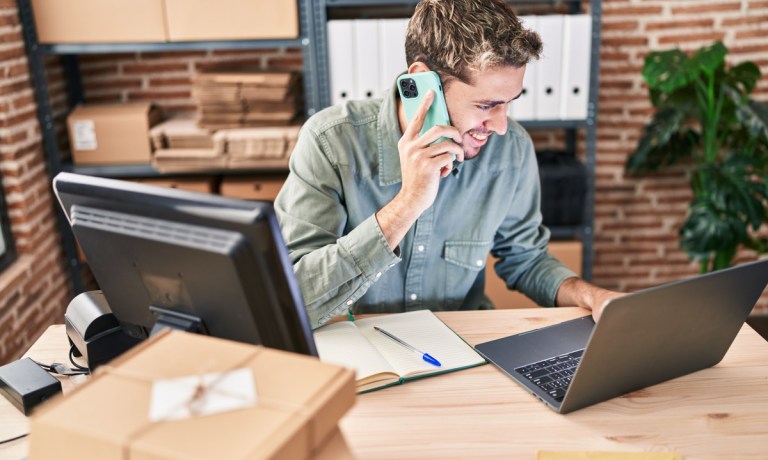 man on phone running eCommerce business