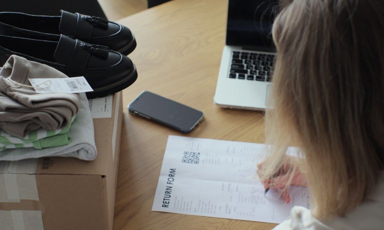 woman returning merchandise online