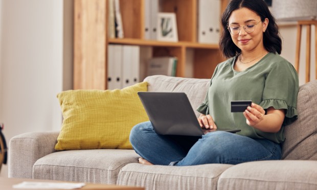 woman with laptop and credit card