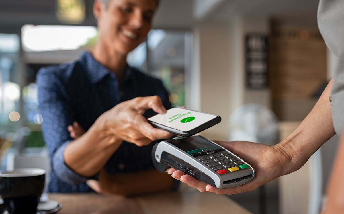 Close Up Of A Womans Hand Paying With Her Smartwatch On A Vending Machine  Scan And Pay A Bill On A Card Machine Making A Quick And Easy Contactless  Payment Nfc Technology