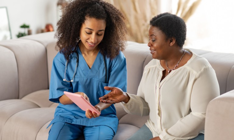 home healthcare nurse with patient