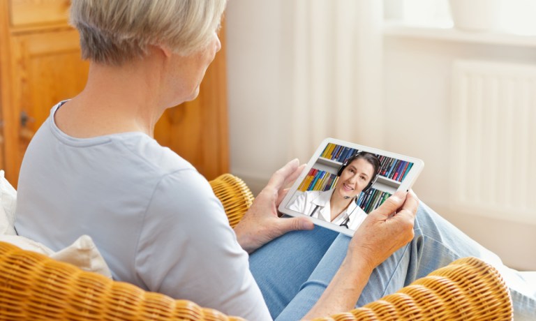 woman with Telehealth app