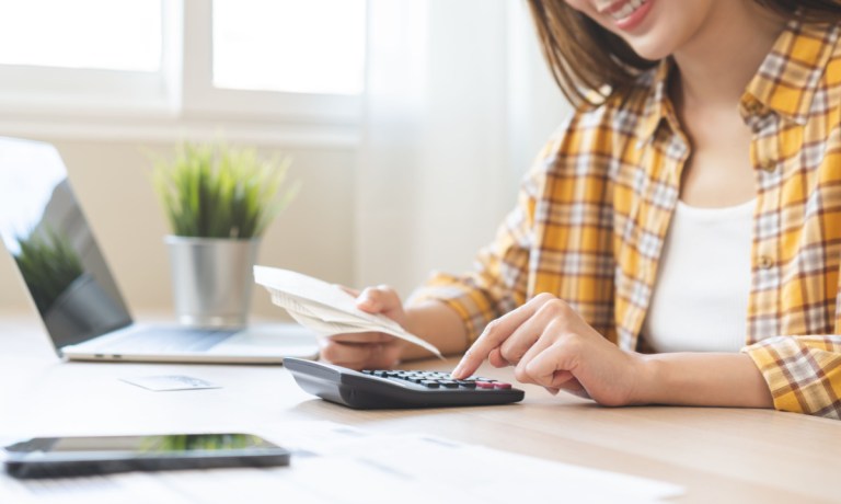 woman balancing budget