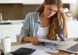 young woman doing household finances