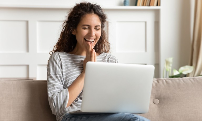 happy woman with laptop