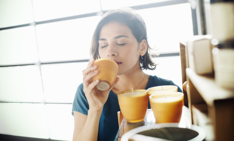 woman with scented candle