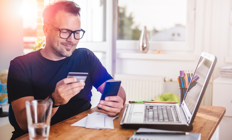 man using credit card