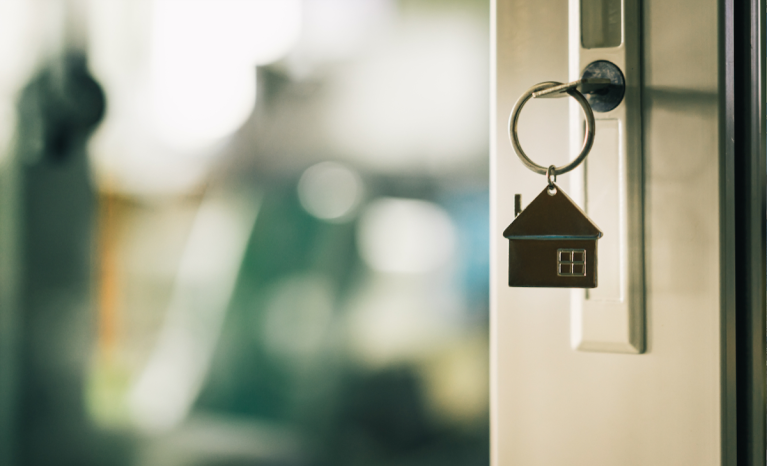 key in door of new house