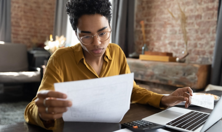 woman looking at papers