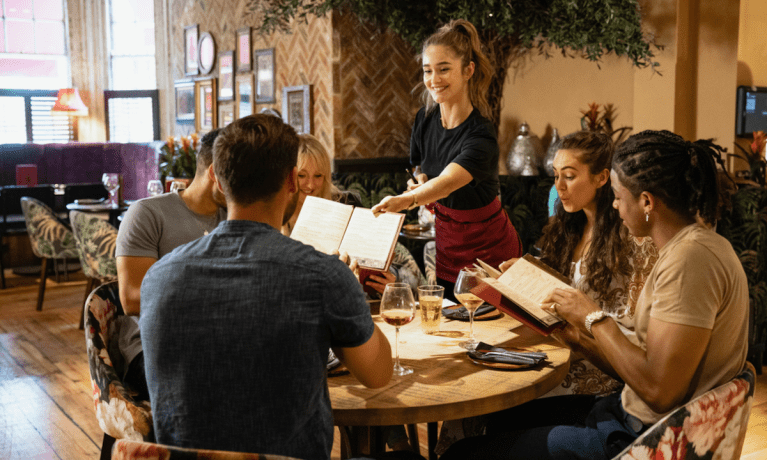 waitress and restaurant patrons