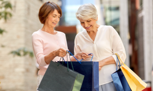 two women with shopping bags