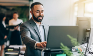 businessman paying on computer