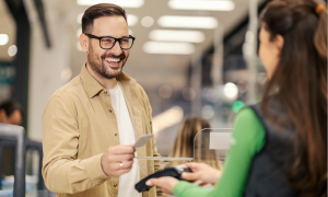 man paying at mobile POS