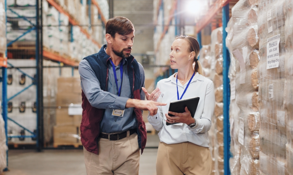 two people in warehouse